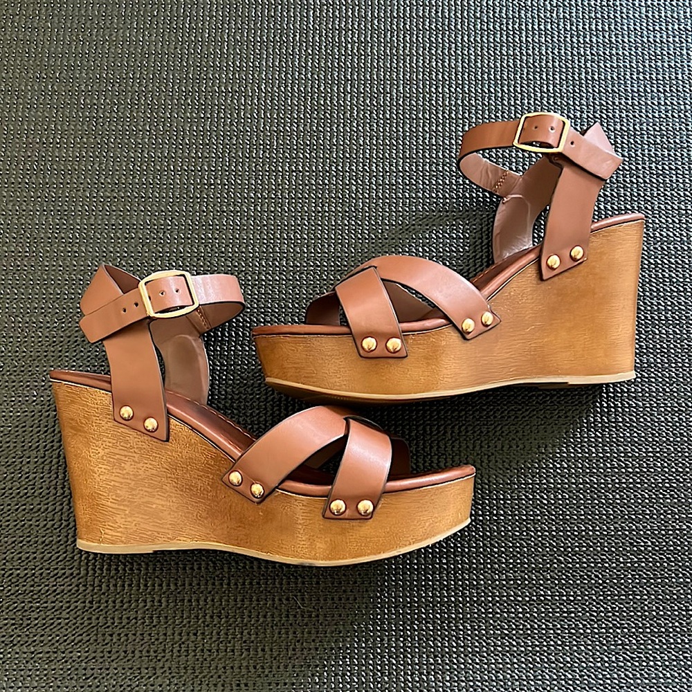 Great pair of dark brownish tan cityclassified wedges!